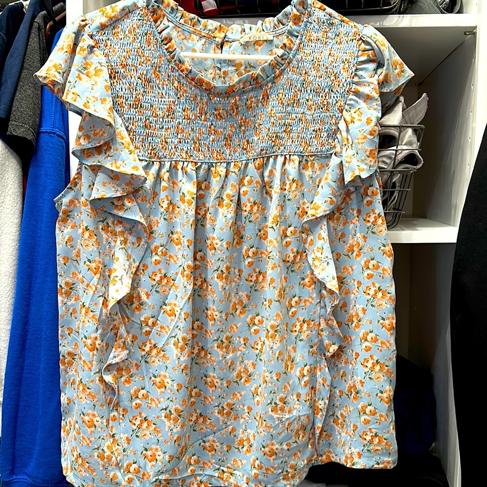 Peach flowered blouse